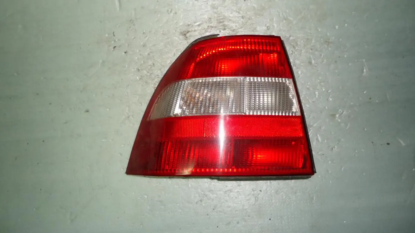Фонарь задний левый к Opel Vectra 1997